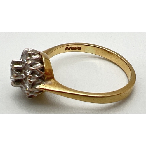 1020 - A vintage 18ct yellow gold diamond cluster ring. Central 0.10ct diamond surrounded by 8 smaller roun... 