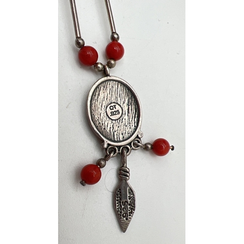 1029 - A silver and red turquoise Native American necklace by Carollyn Pollack and Quoc Turquoise Inc. Oval... 