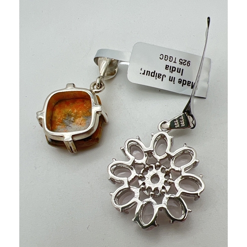 1037 - 2 silver natural stone set pendants by The Genuine Gem Company, new with tags. A flower design penda... 