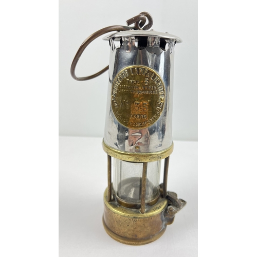 An antique Protector Lamp & Lighting Co miners lamp, type 6  No 35. Approx. 24cm tall.