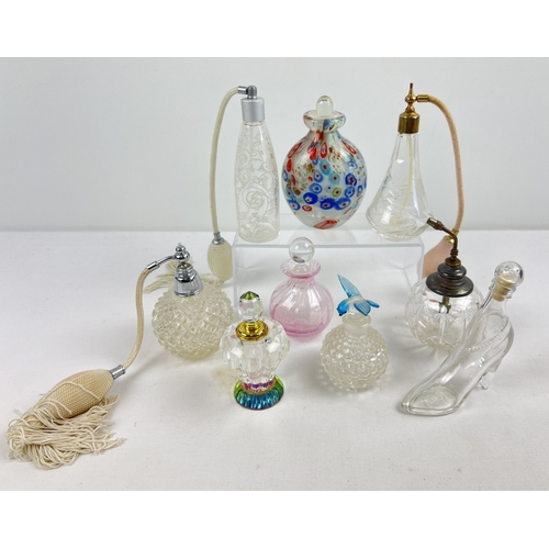 1286 - A collection of 9 assorted glass perfume bottles and atomisers, to include Caithness. Largest approx... 