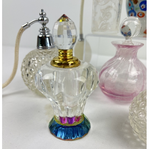 1286 - A collection of 9 assorted glass perfume bottles and atomisers, to include Caithness. Largest approx... 