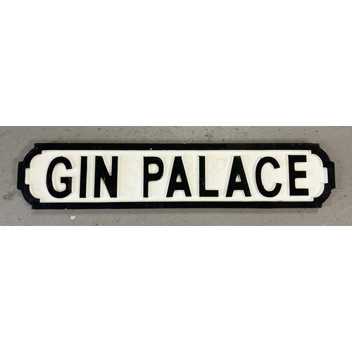 1323 - A modern painted wood 'Gin Palace' sign, in the style of an old street sign. Approx. 65cm long.