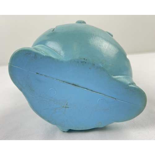 1312 - A vintage 1960's moulded pale blue plastic Porky Pig money box, containing a small amount of vintage... 