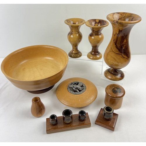 1313 - A collection of vintage and modern wooden items. To include turned vases, a large fruit bowl, a trin... 