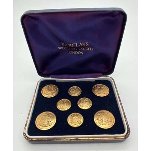 1317 - A vintage set of Barclays Woollen Co Ltd, London, gold tone buttons, in original box.