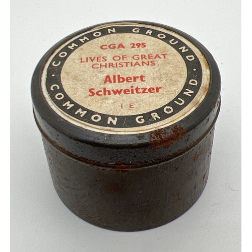 1318 - A small tin of Albert Schweitzer film 