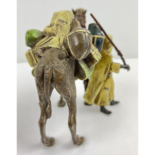 1225 - After Franz Bergmann - a cold painted bronze figure modelled as an Arab with his camel. Approx. 13cm... 