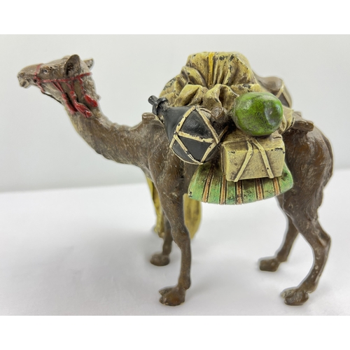 1225 - After Franz Bergmann - a cold painted bronze figure modelled as an Arab with his camel. Approx. 13cm... 