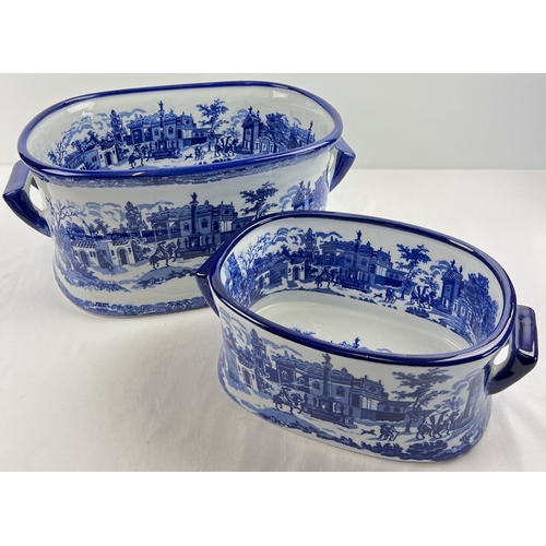 1271 - 2 large blue & white ceramic foot baths decorated with Victorian urban scenes. Largest approx. 20cm ... 