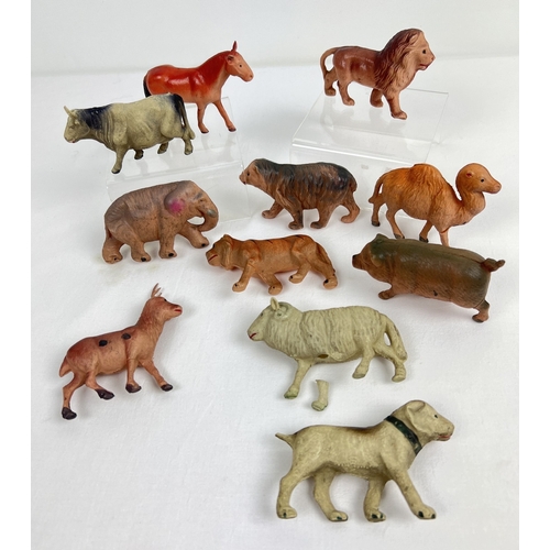 142 - A collection of early 20th century Japanese celluloid toy farm and zoo animals, some marked Made in ... 