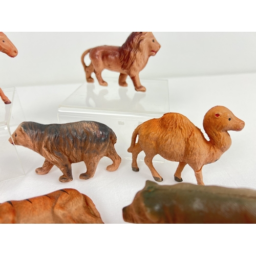 142 - A collection of early 20th century Japanese celluloid toy farm and zoo animals, some marked Made in ... 