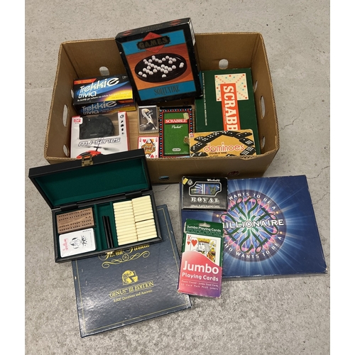 146 - A box of assorted games, toys and packs of playing cards to include Trekkie Trivia quiz game, boxed ... 