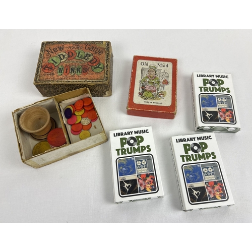 147 - A small collection of games. Comprising antique Jacques Tiddly Winks and antique Old Maid cards. Als... 