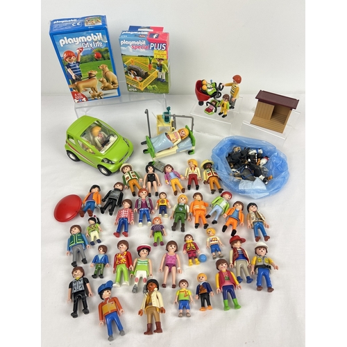 163 - A collection of assorted vintage Playmobile small playsets and accessories, to include some boxed. L... 