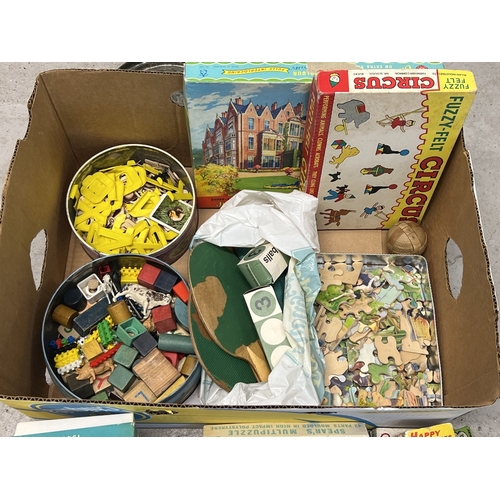 173 - A box of assorted vintage toys, games and puzzles, to include wooden jigsaws, Spear's games, Fuzzy F... 