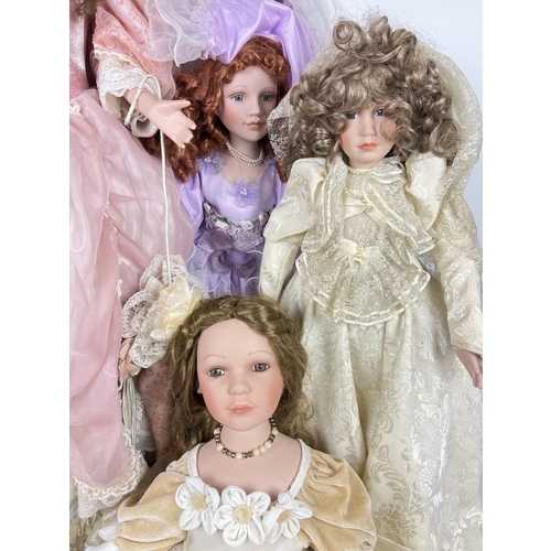 191 - A collection of vintage dolls to include 3 large soft bodied porcelain dolls. Also includes a very l... 