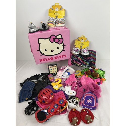 207 - A collection of assorted Build-a-Bear clothes, shoes and accessories to include Sketchers Twinkle To... 