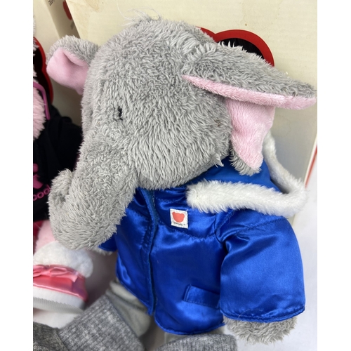 212 - 2 boxed Chad Valley DesignaBear plush toys with clothing and accessories. A grey elephant and a pink... 