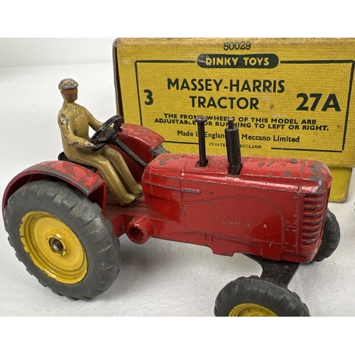 234 - A Dinky Toys No. 27A Massey-Harris Tractor original yellow card trade box with 3 examples. Red body,... 