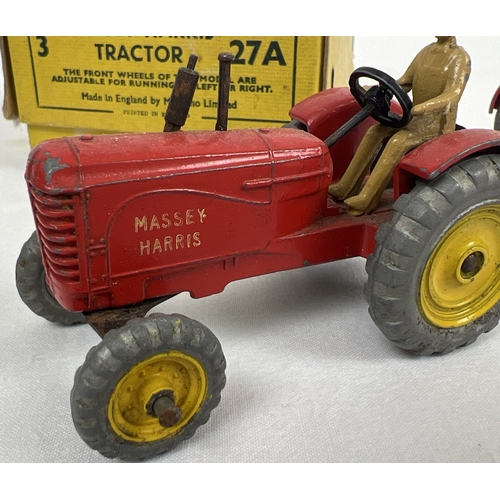 234 - A Dinky Toys No. 27A Massey-Harris Tractor original yellow card trade box with 3 examples. Red body,... 