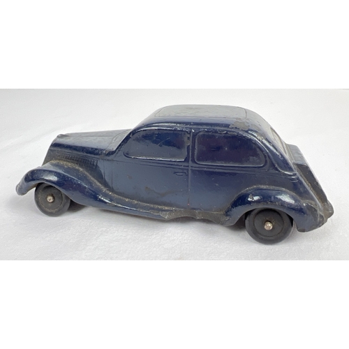 283 - A 1930's Lilo Toys Bakelite model of a saloon car in dark blue. Makers mark to underside. Approx. 13... 