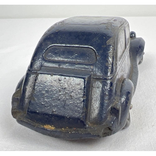 283 - A 1930's Lilo Toys Bakelite model of a saloon car in dark blue. Makers mark to underside. Approx. 13... 