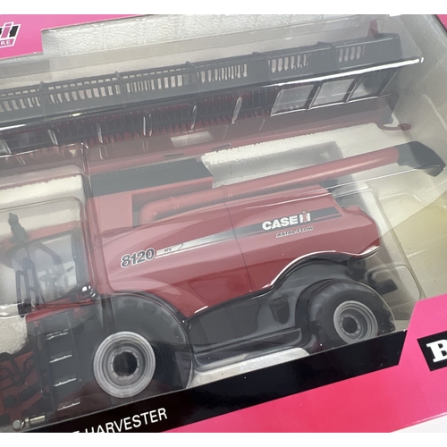 303 - Boxed Britains 42546 Ertl Case IH 8120 combine harvester, 1:32 scale, as new. Some fading to box.