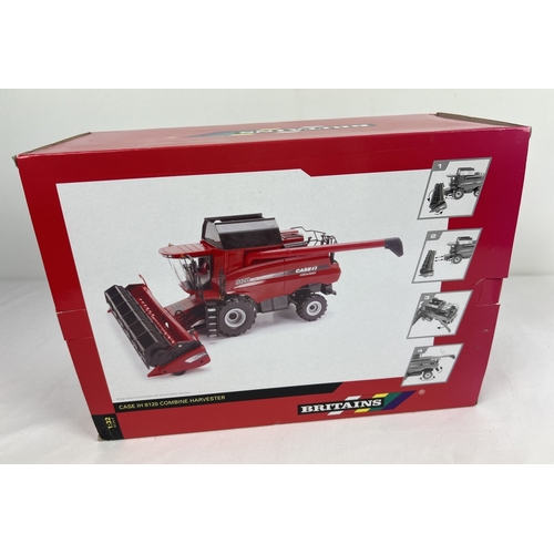 303 - Boxed Britains 42546 Ertl Case IH 8120 combine harvester, 1:32 scale, as new. Some fading to box.