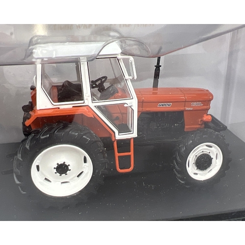 308 - Boxed Universal Hobbies Fiat 1300 DT Super -1976 diecast 1/43 scale model tractor. In plastic displa... 