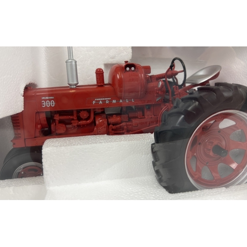 314 - A boxed Speccast 1/16 scale diecast model of an International Harvester Farmall 300 LP Gas tractor. ... 