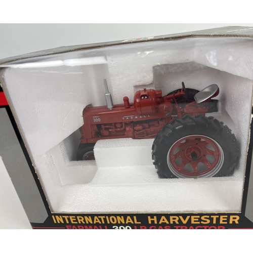 314 - A boxed Speccast 1/16 scale diecast model of an International Harvester Farmall 300 LP Gas tractor. ... 