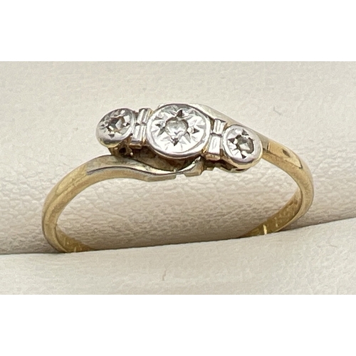 1009 - A 1930's 18ct gold, platinum and diamond twist design ring set with 3 small diamonds. Ring size S. W... 