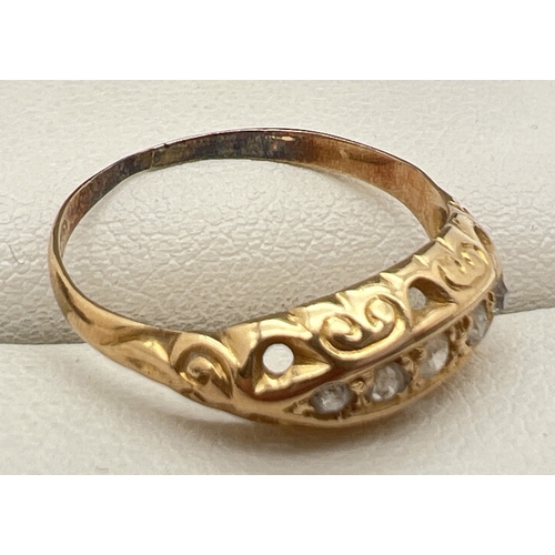 1079 - A vintage 9ct gold 5 stone diamond ring with decorative pierced design mount. Hallmark inside band i... 