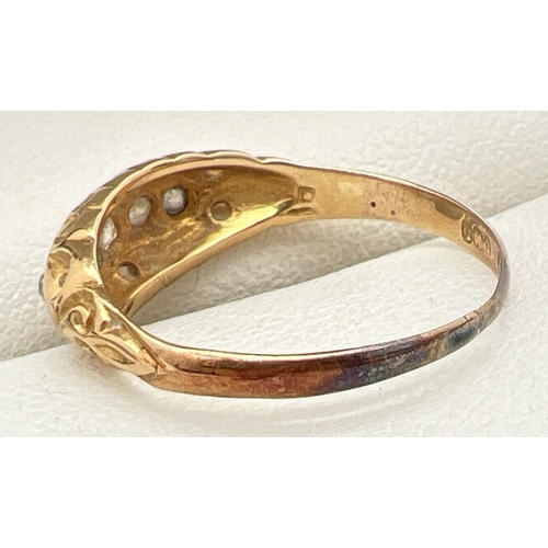 1079 - A vintage 9ct gold 5 stone diamond ring with decorative pierced design mount. Hallmark inside band i... 