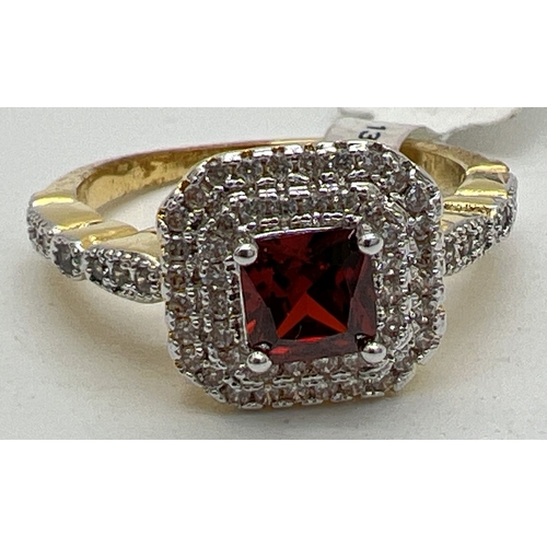 1161 - A 14ct gold plated cocktail ring, new with tags, set with Swarovski crystals. Central square cut red... 