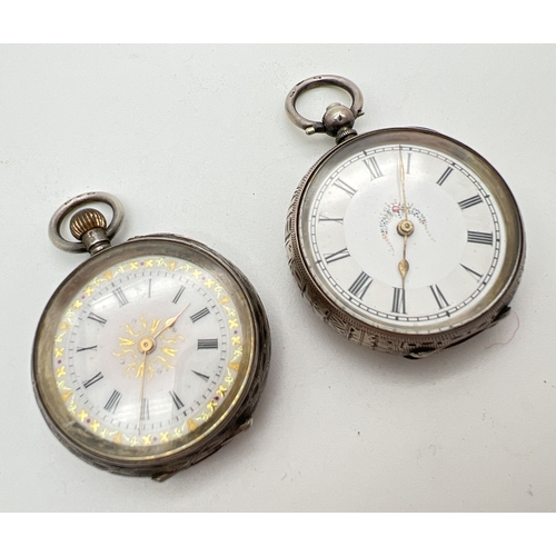 1183 - 2 ladies vintage 935 silver pocket watches. One with geometric and floral design case and empty cart... 