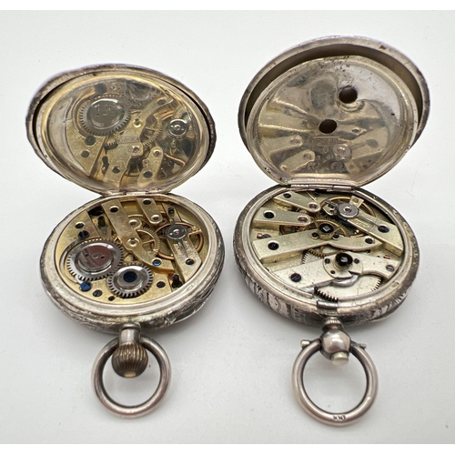 1183 - 2 ladies vintage 935 silver pocket watches. One with geometric and floral design case and empty cart... 