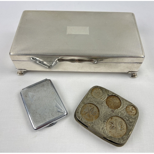 1242 - An Edwardian nickel plated coin case together with an Art Deco vesta match case and an Aristocrat si... 