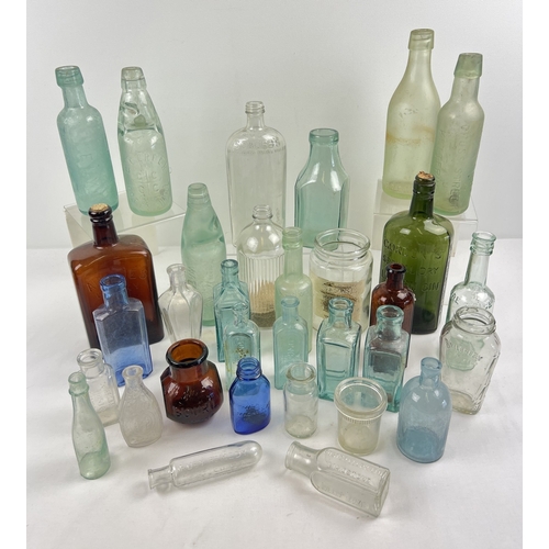 1285 - A collection of antique and vintage glass bottles and jars. To include The Cambridge lemonade by Chi... 