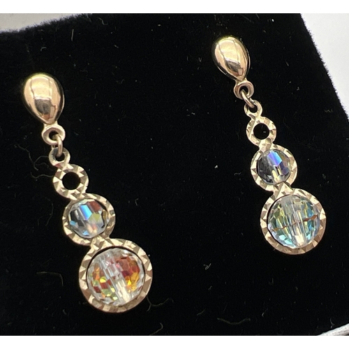 1013 - 3 pairs of gold stone set earrings. A pair of vintage drops set with Aurora Borealis crystals, a pai... 