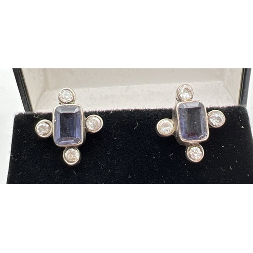 1031 - 2 pairs of silver and semi precious stone set earrings. A pair of lever back style studs set with sq... 