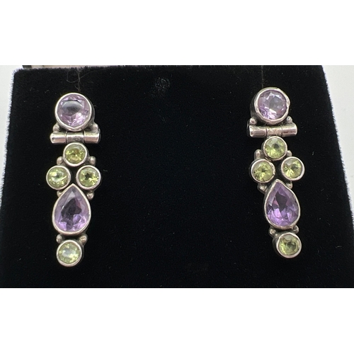 1031 - 2 pairs of silver and semi precious stone set earrings. A pair of lever back style studs set with sq... 