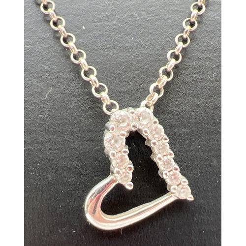 1039 - 3 silver pendant necklaces. A silver knot on a 16