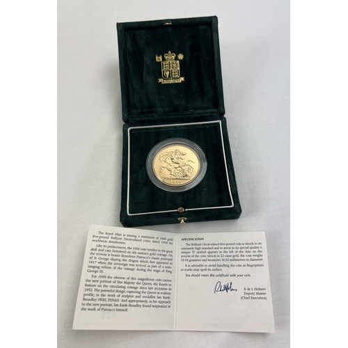 1218 - A boxed Royal mint limited edition 1998 22ct gold Brilliant Uncirculated £5 coin. No. 426/1000. St. ... 