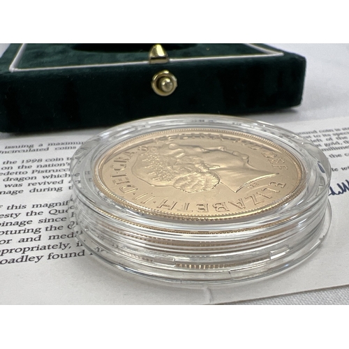 1218 - A boxed Royal mint limited edition 1998 22ct gold Brilliant Uncirculated £5 coin. No. 426/1000. St. ... 