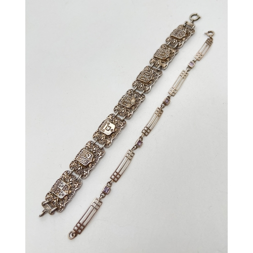 1069 - 2 decorative silver bracelets. A 7