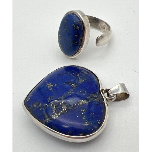 1072 - 2 pieces of Lapis Lazuli set jewellery. An adjustable size dress ring set with an oval cut stone and... 