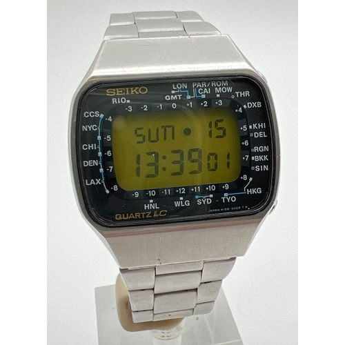 A vintage 1970's Pan Am M158-5009 digital watch by Seiko. Stainless steel case with Quartz LC screen. World time zones, day and date function. Fitted with a stainless steel Casio strap. In working order.