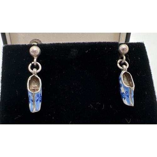 1096 - A pair of vintage Dutch white metal enamelled clog earrings with blue & white windmill designs. Scre... 